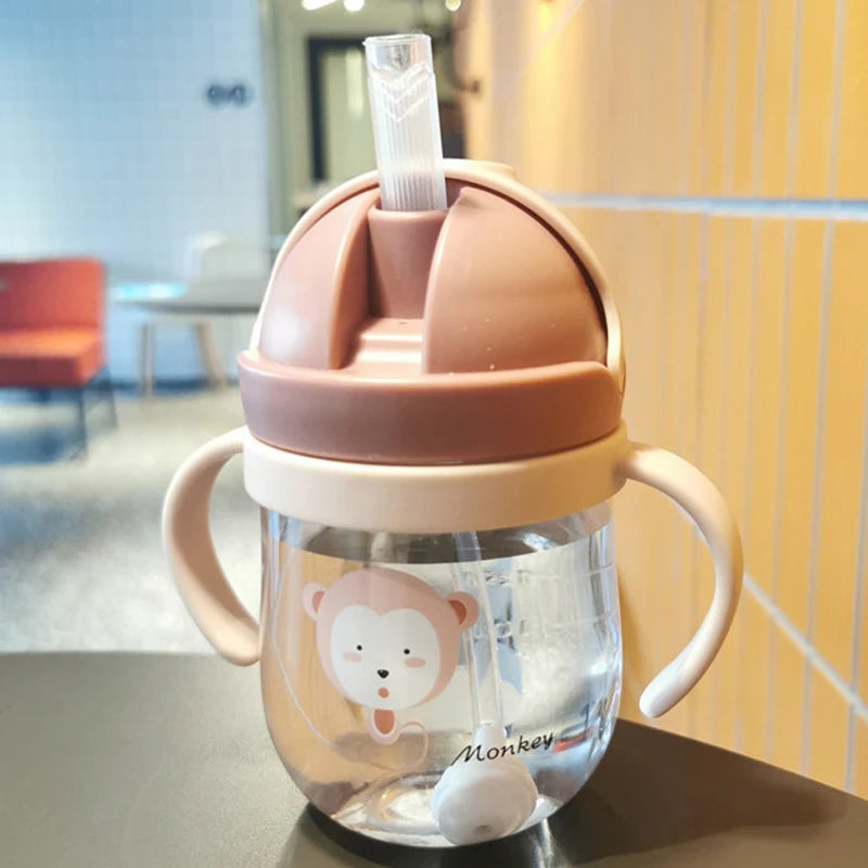 Kids' Cartoon Animal Water Bottle – Straw Cup with Gravity Ball & Shoulder Strap